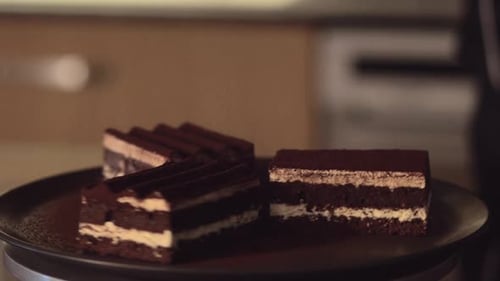 Chocolate Cake Close Up Sprinkled with Powder