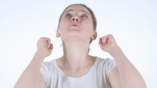 Excited Redhead Woman Celebrating Success