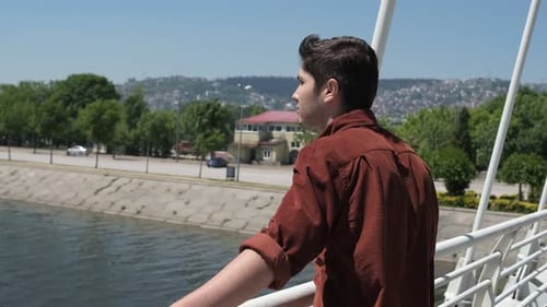 Man Watching Landscape on Bridge