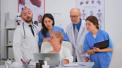 Medical Team Collaborating in Doctor's Office