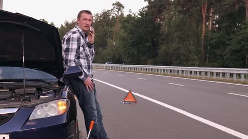 Guy Near Broken Car Roadside