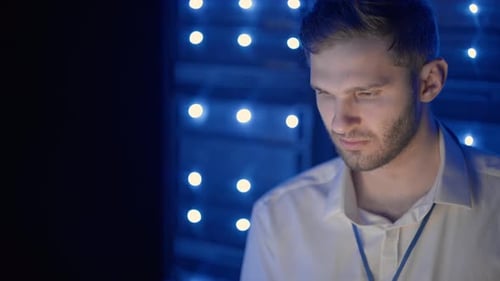 Young Adult Working in Server Room