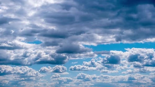 Timelapse of White Cumulus Clouds Moving in the Blue Sky Cloud Space
