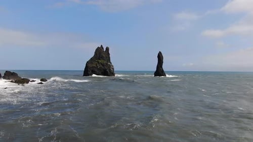 Aerial view of Reynisdrangar basalt sea stacks near Reynisfjara beach, Iceland