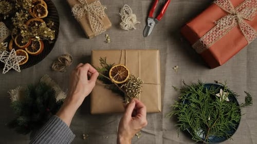 Decorating Holiday Gift With Dried Oranges
