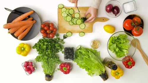 Overhead View of Person Preparing Colorful Vegetables