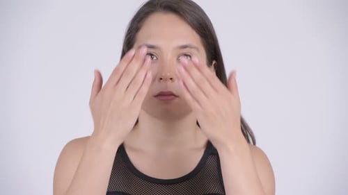 Young Multi-ethnic Woman Covering Eyes As Three Wise Monkeys Concept