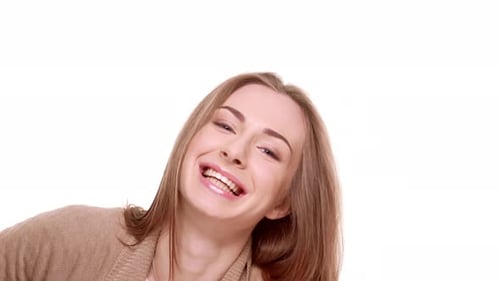 Young Woman Laughing and Smiling on White Background