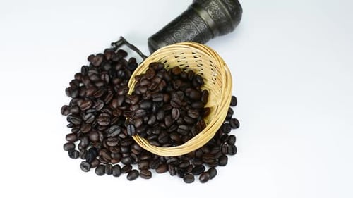 Coffee Beans and Grinder on White Background