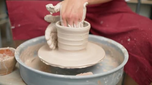 Handicraft the Potter Makes a Pitcher Out of Clay Closeup View of the Hands Production of Handmade