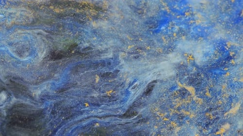 Abstract Blue, White, and Gold Swirling Background