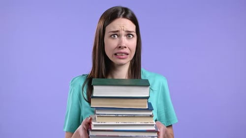 European Student is Dissatisfied with Amount of Homework and Books on Violet Background