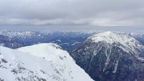 Aerial View of the Alps Winter Mountains