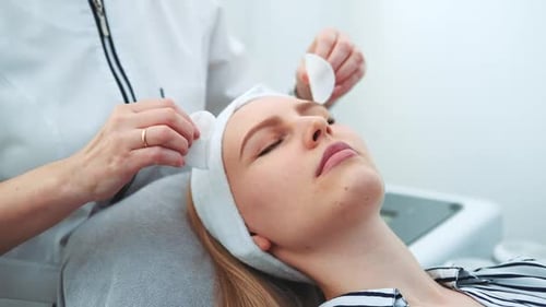 Woman Face Cleaning in Beauty Clinic