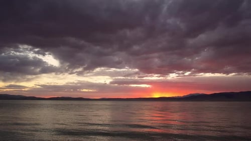 Colorful sunset over Utah Lake on summer evening