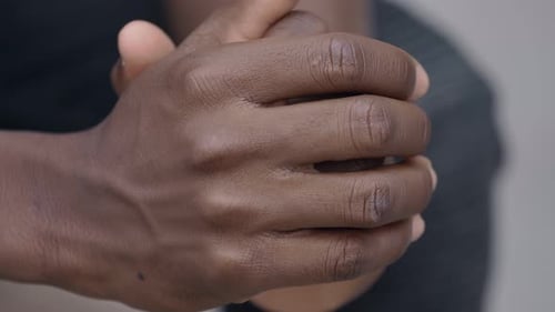 Close Up of Mans Face and Hands
