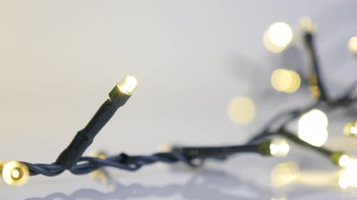 Sequence of decorative fairy lights close-up 4K 2160p 30fps UltraHD footage - Christmas sparkles on