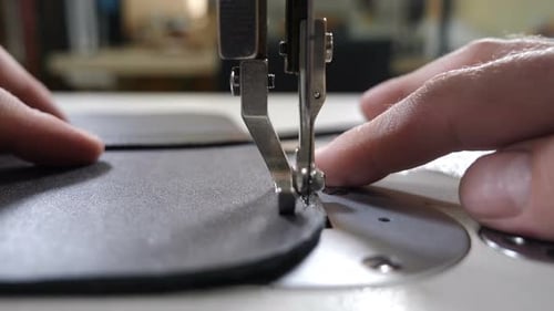 Craft Leather Workshop and Manufacture. Close-up of Master Sewing Pieces of Leather, Stitches Straps