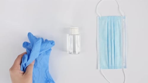 Personal Protective Equipment with Surgical Gloves and Mask