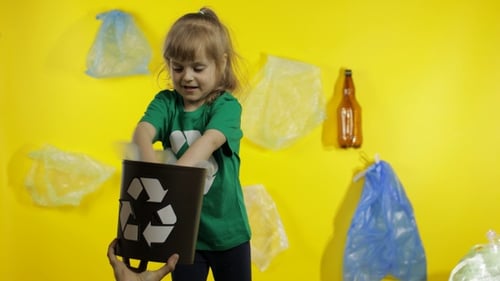 Girl Activist Free Up From Plastic Packages on Her Neck and Head. Plastic Pollution. Save Ecology