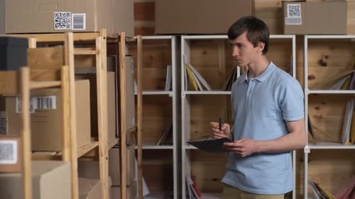 Post Office Clerk Performing Inventory of Parcels