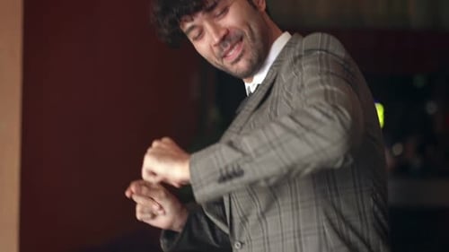 A Man Dancing with Joy and Fun