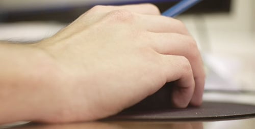 Hand On Computer Mouse