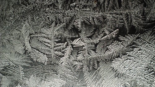 Melting Ice Crystals Creating Abstract Patterns