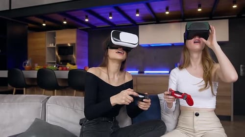 Two Women Playing VR Games Together