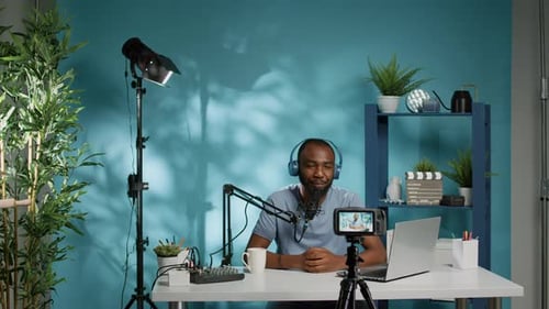 Man Recording Podcast in a Modern Studio