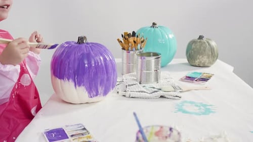 Step by step. Painting craft pumpkin with acrylic paint to create decorated mermaid Halloween pumpki