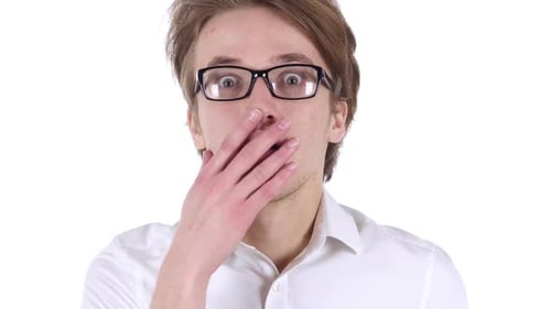 Man is Shocked and Covers Mouth in Surprise