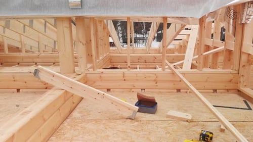 Inside View of a Wooden Frame House Under Construction