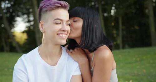 Portrait of Happy Lesbian LGBT Woman in the Park
