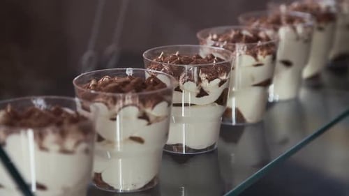 Dessert Tiramisu in Glasses on the Cafe Window