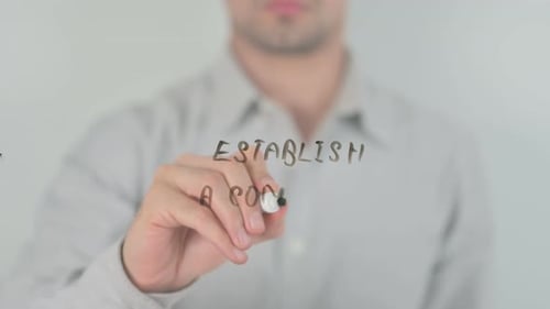 Establish A Company Writing on Screen with Hand