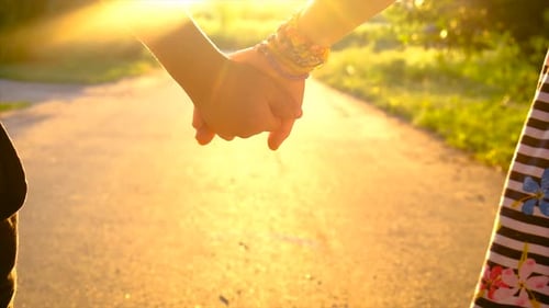 Children Walk Hand in Hand