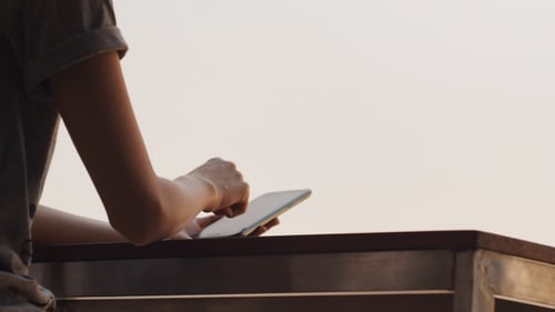 Woman Using Touch Screen Smartphone
