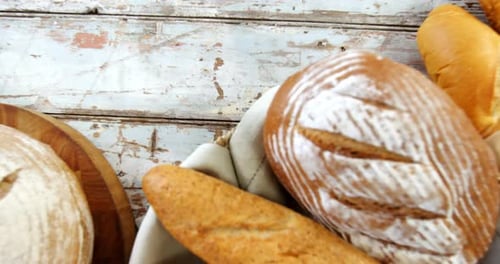 Artisan Bread Assortment Displayed on Distressed Wood