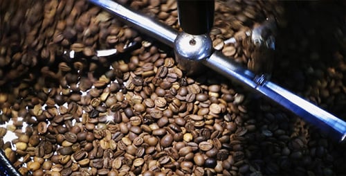 Coffee Beans Stirred in a Roasting Machine