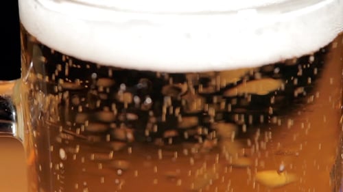 Beer Bubbles in Glass Mug Close Up