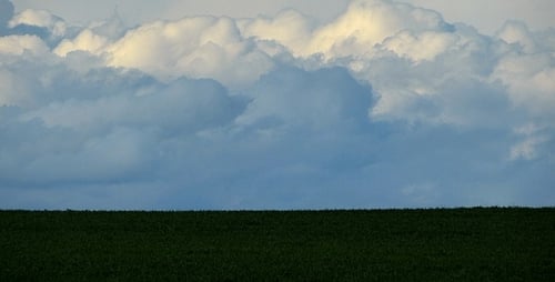 Green Meadow and Clouds