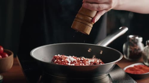 Chef Frying Ribs Closeup