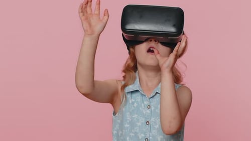 Young Child Enjoys Virtual Reality with VR Headset