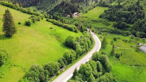 Aerial View Road in the Mountains Among the Picturesque Landscape of Green Mountains, The Mountain