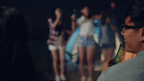 Friends Celebrating Together at an Evening Gathering