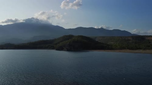 Landscape of the Mediterranean Sea in Turkey Against Green Mountain Range Filmed By Drone