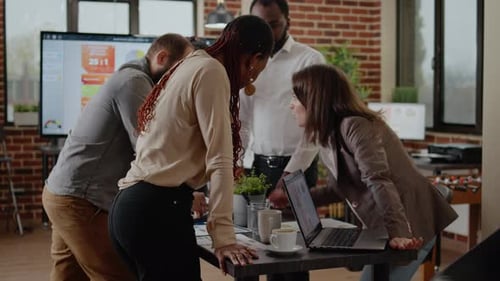 Close Up of Multi Ethnic Team Working on Business Project