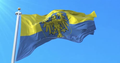 Waving Yellow and Blue Flag with Golden Eagle Emblem