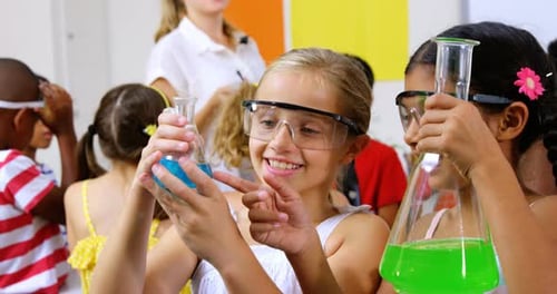 Elementary School Students Doing Science Experiment